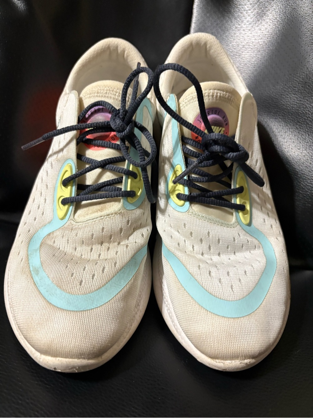 Nike Off-White Sneakers with Light Blue and Black Accents